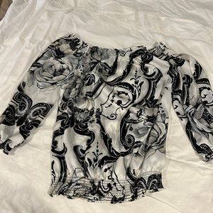 White House Black Market mid sleeve with arm cut outs